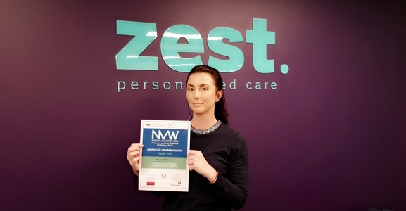 Hayley With Volunteer Certificate