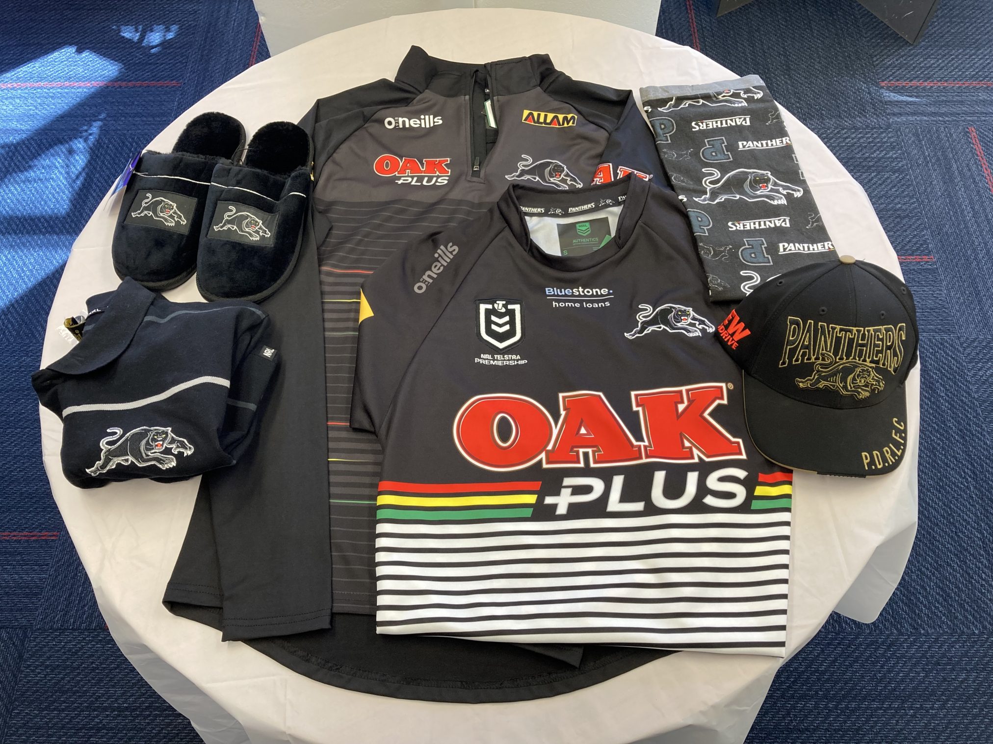 Panthers merchandise bundle laid out on a white table.