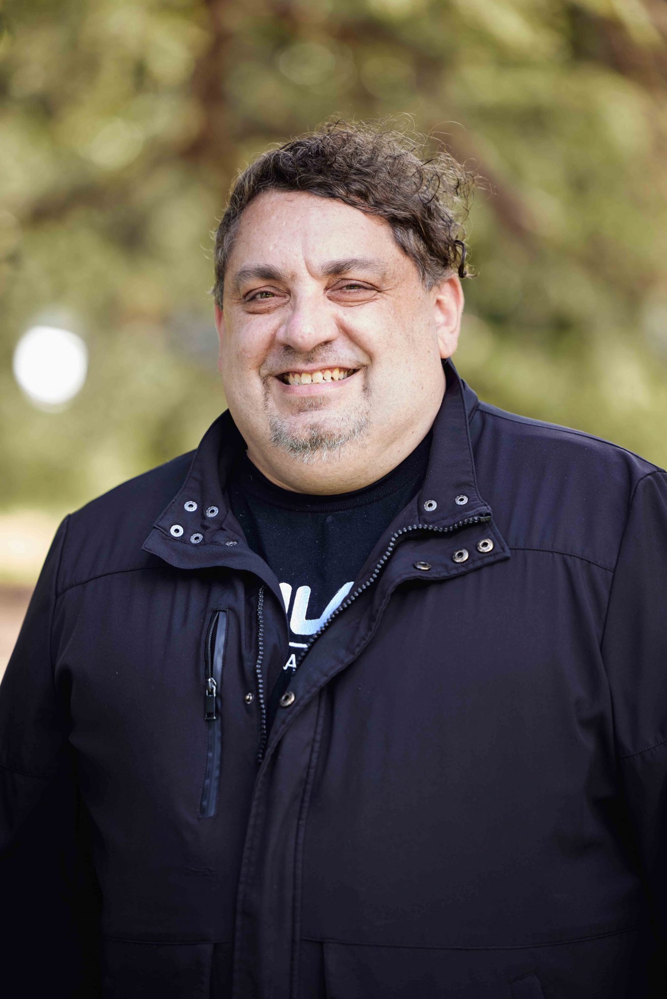 Portrait of Support Worker smiling at the camera.